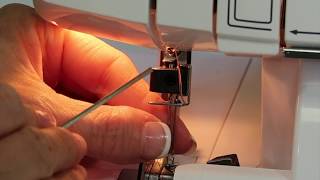 Brother 1034D Serger 14 How to Change Needles [upl. by Cavallaro880]