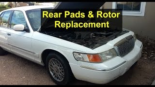 Rear brake pads and rotor replacement Mercury Grand Marquis  VOTD [upl. by Ardnuas295]