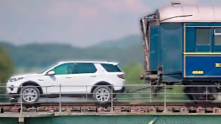 Land Rover Discovery Pulls 100Ton Train [upl. by Assanav464]