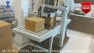 Carton Sealing Machine  Carton Tapping Machine Carton Sealer FXJ 6050  Automatic Tapping Machine [upl. by Aelem]