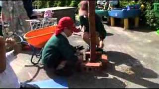 Early Years Foundation Stage Children play at being in a builders yard [upl. by Neirrad]