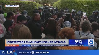 Protesters clash with police at UCLA [upl. by Adur]