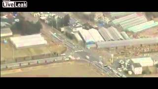 Aerial view of tsunami striking Sendai Japan [upl. by Jessamyn403]