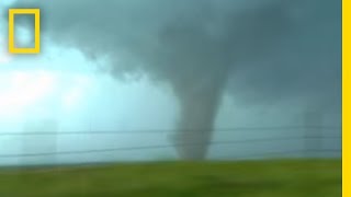 Tornadoes Lightning in Rare Video  National Geographic [upl. by Seyah]