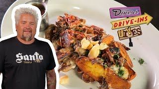 Guy Fieri Eats Fingerling Potato Poutine  Diners DriveIns and Dives  Food Network [upl. by Laicram]