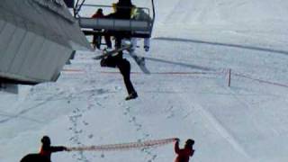 Skier hanging from ski lift [upl. by Sudderth]