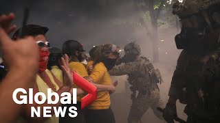 Portland protests Violence escalates as protesters continue to face off with federal police [upl. by Adnilym583]