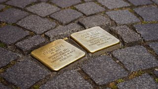 Stolpersteine The stumbling stones memorial to Holocaust victims [upl. by Assenay]