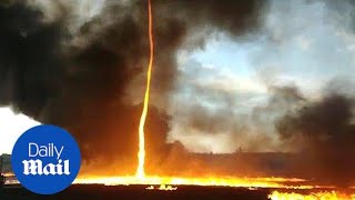 Incredible footage of fire tornado during massive factory blaze [upl. by Hindorff310]