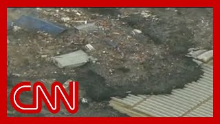 Watch a massive tsunami engulf entire towns in Japan 2011 [upl. by Constanta]